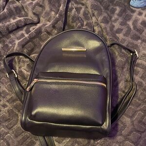 Black Medium-sized Leather Convertible Backpack